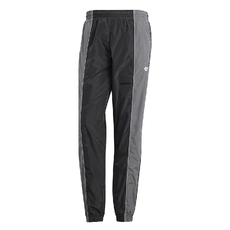 Simple Styles adidas - Men's Rekive Woven Track Pant (IM1820)